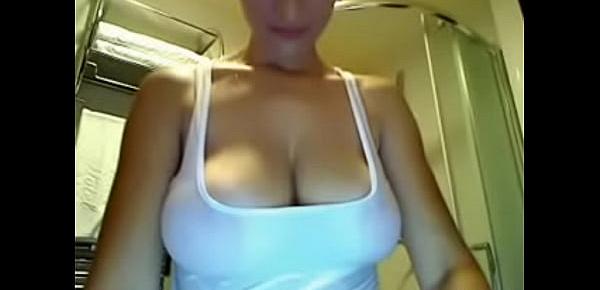  Busty natural takes a shower using white shirt